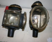 Pair of oval fronted carriage lamps with magnified lenses (view in security pen)