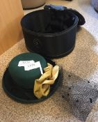 Green hat with a hat box
