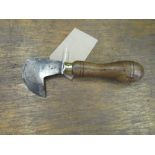 A saddler's head knife (view in security pen)