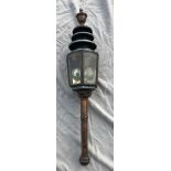 Black/brass hexagonal Hearse lamp by J. Marston & Co., Birmingham (view in security pen)