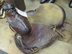 A decorative American saddle to suit a very small child