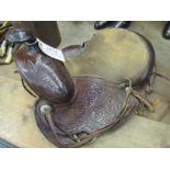 A decorative American saddle to suit a very small child