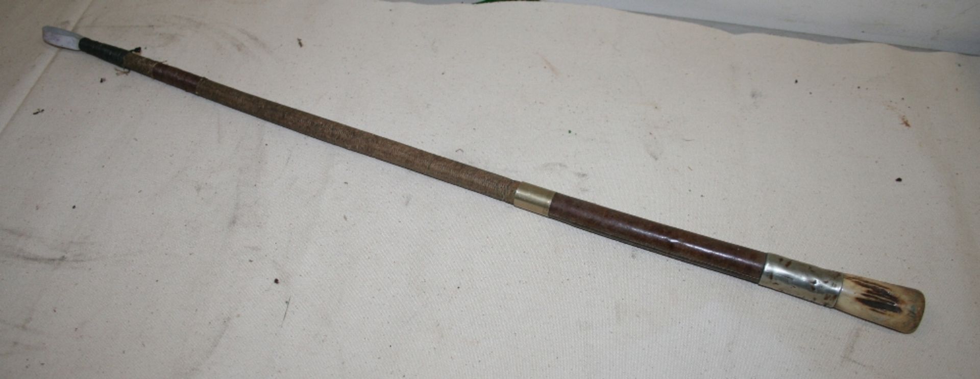 Dealer's whip with a bone handle