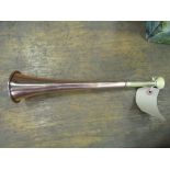 Copper hunt horn with brass ferrule and ivorine mouthpiece, made by Percival, St James Street,