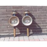 Pair of large round fronted carriage lamps by Morgan & Co., Ltd., Long Acre, London