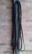 Pair of plaited brown leather reins, 14ft long