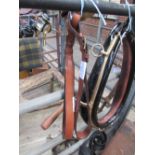 Pair of brown leather grab handles with brass buckles