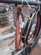 Pair of brown leather grab handles with brass buckles