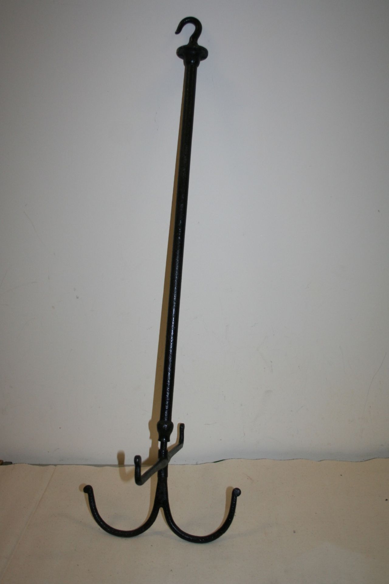 An extendable harness cleaning hook