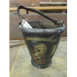 A fine and heavily crested fire bucket complete with a leather handle, inscribed with a motto '