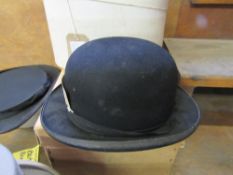 Black bowler hat by Dunn & Co.