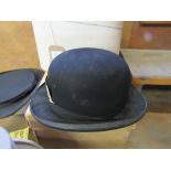 Black bowler hat by Dunn & Co.