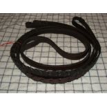Pair of cob size brown leather laced driving reins