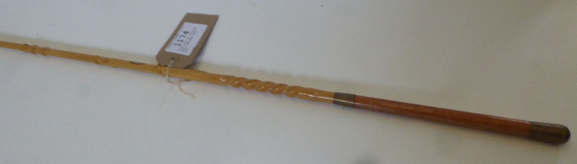 Holly whip by Clothier and a mahogany whip reel