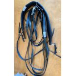 Breeching leather and leather reins