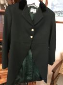 Three good quality green livery tail coats with brass buttons by Tom Brown of Eton, size 10-12,