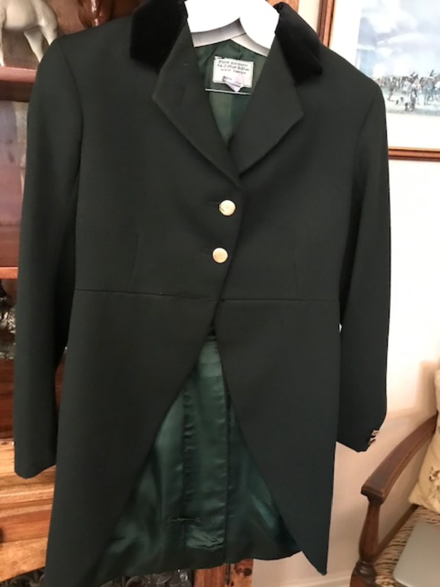 Three good quality green livery tail coats with brass buttons by Tom Brown of Eton, size 10-12,