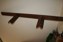 Double wooden saddle rack