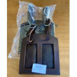 Two brown leather number holders