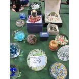 Collection of 19 glass paperweights and a stone egg. Estimate £50-70.