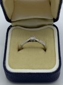 9ct white gold diamond set solitaire engagement ring, 0.15ct. Estimate £50-80.