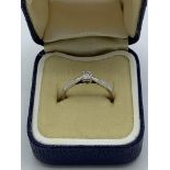 9ct white gold diamond set solitaire engagement ring, 0.15ct. Estimate £50-80.