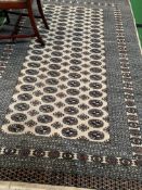 Beige ground patterned rug, 250 x 160. Estimate £20-40