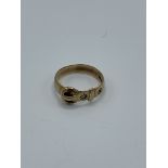 9ct gold buckle ring, size O1/2, weight 3.0gms. Estimate £30-50.