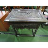 Carved oak side table with frieze drawer, 81 x 61 x 76cms. Estimate £40-60.