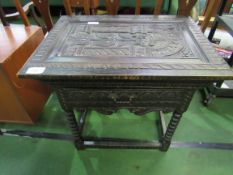 Carved oak side table with frieze drawer, 81 x 61 x 76cms. Estimate £40-60.