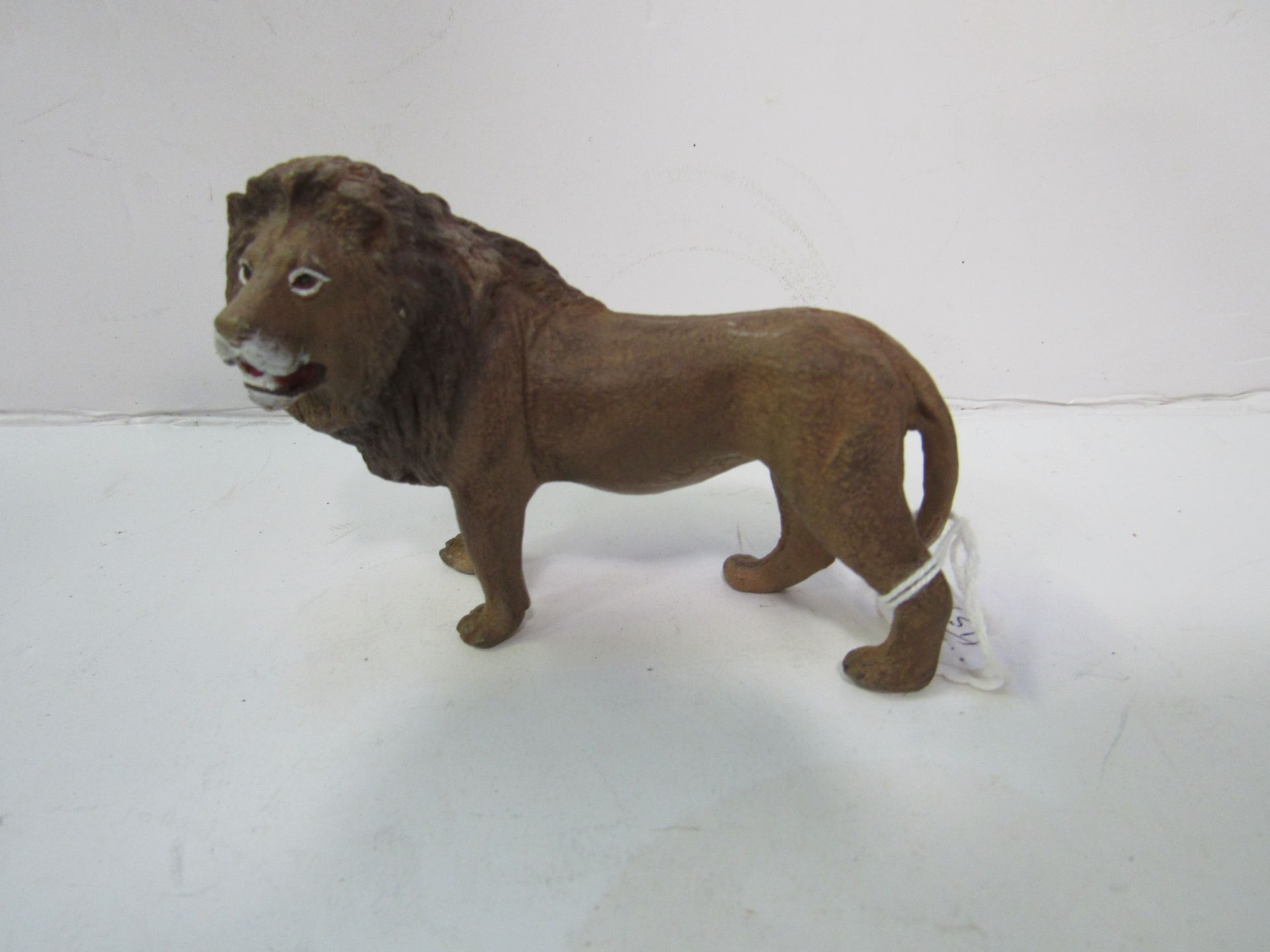 Cold painted bronze lion figure with Bergman jar mark underneath. Estimate £30-50. - Image 2 of 2