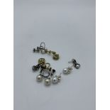 Pair of 925 silver and pearl earrings together with 4 other pairs of earrings together with a