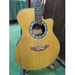 Tanglewood electro-acoustic guitar. Estimate £30-50.