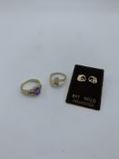 Yellow metal mauve stone ring and another and 9ct gold hallmarked earrings. Estimate £20-30