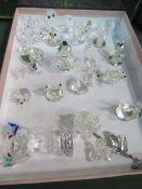 Collection of crystal animal figurines together with a brass and glass display case. Estimate £30-