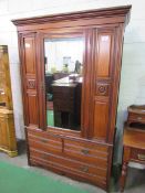 Mahogany wardrobe with mirror door over 2 and 1 drawers. 132 x 51 x 207cms. Estimate £30-50.