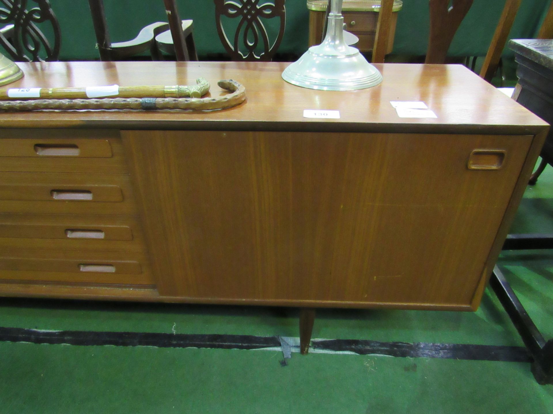 Teak sideboard with 4 centre drawers flanked by cupboards, 222 x 43 x 72cms. Estimate £80-120. - Image 2 of 4