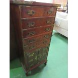 Oriental-style lacquered cabinet of 5 drawers over cupboard. 51 x 35 x 110cms. Estimate £30-50.