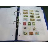 Box of stamps, world collection in 3 binders. Estimate £25-30.