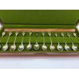 Boxed set of 12 Royal Horticultural flower spoons in solid sterling silver inset 24ct gold on silver