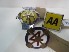 An AA badge ref: 092104; a square AA badge and 4 cylinder Club of America enamel and brass car