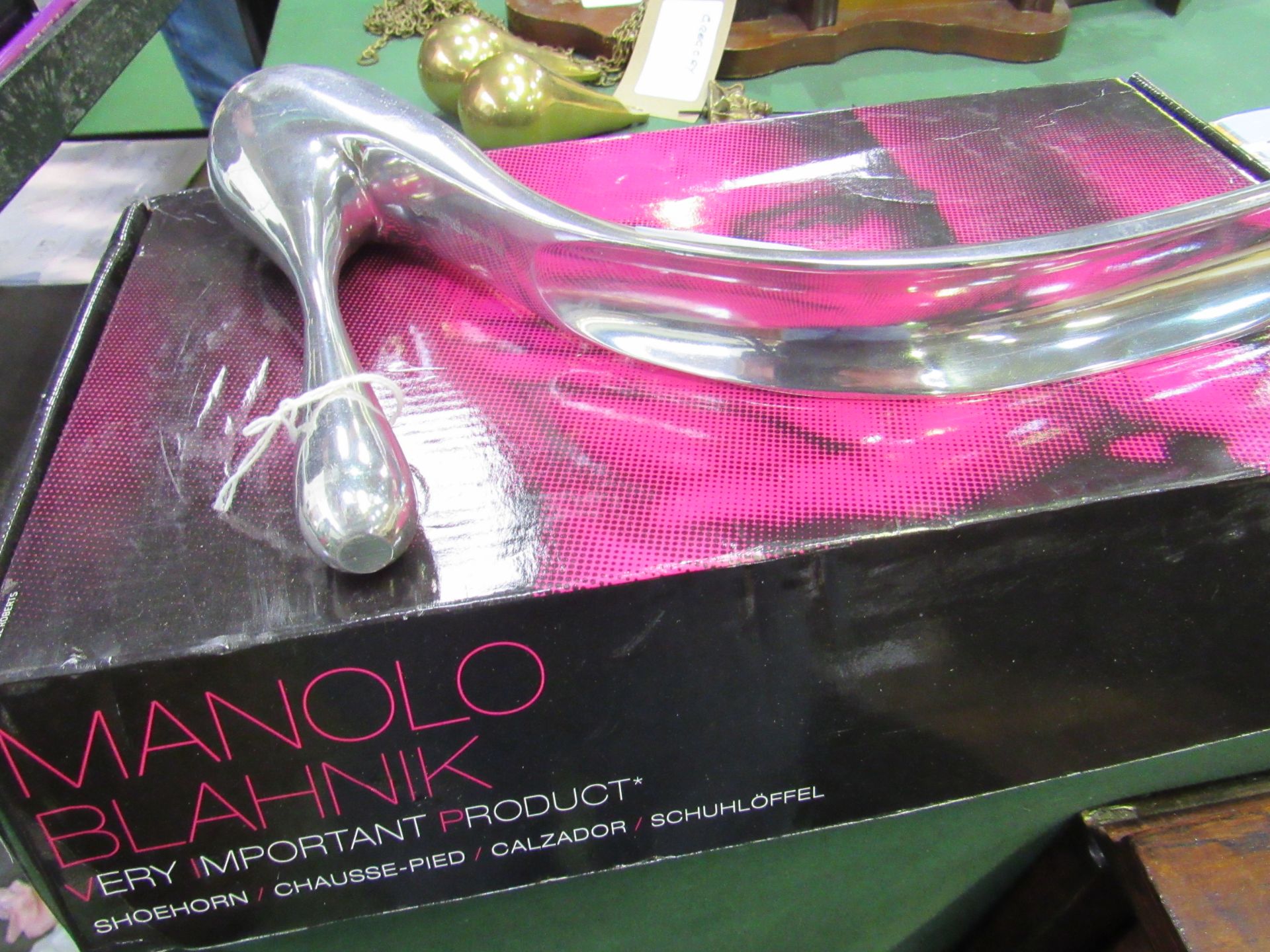 Manolo Blahnik white metal shoe horn. Estimate £30-40. - Image 2 of 2