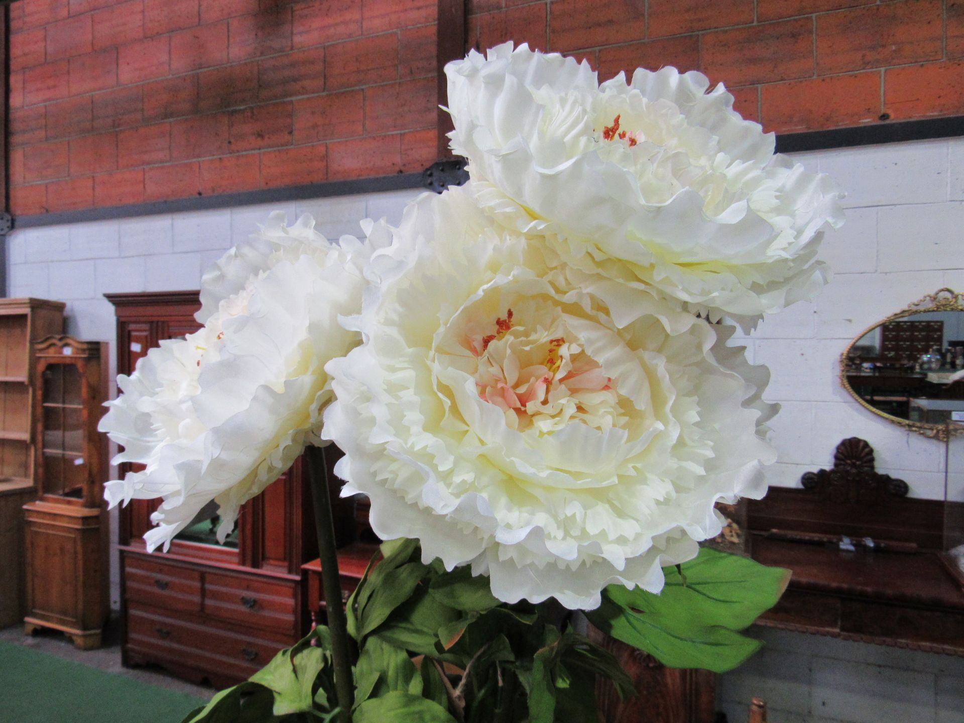 Tall white metal vase complete with 3 artificial peonies. Height 66cms. Estimate £20-30. - Image 2 of 2