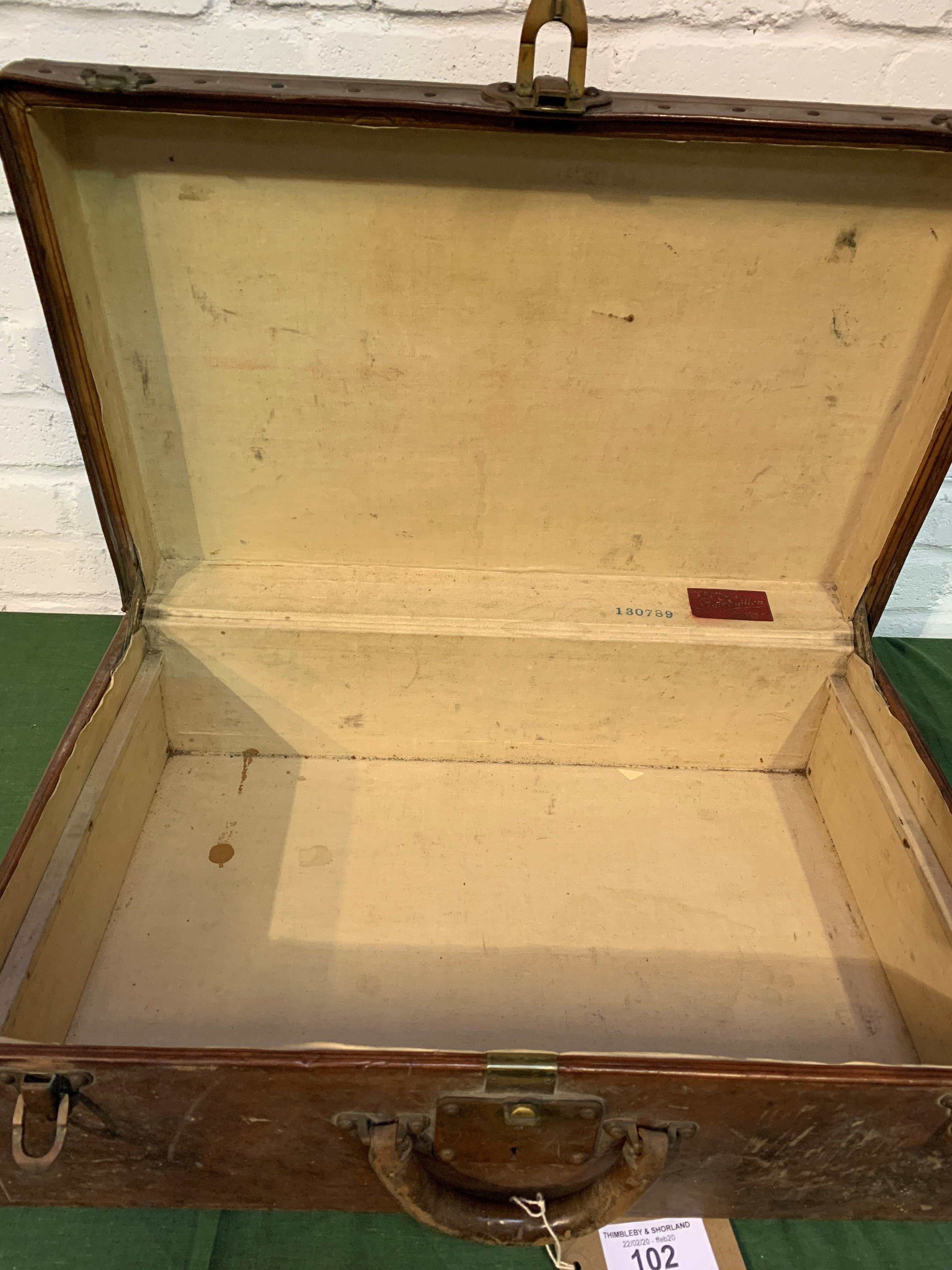 Louis Vuitton suitcase in original condition. Serial number 130789. 61 x 39 x 22cms. Estimate £20
