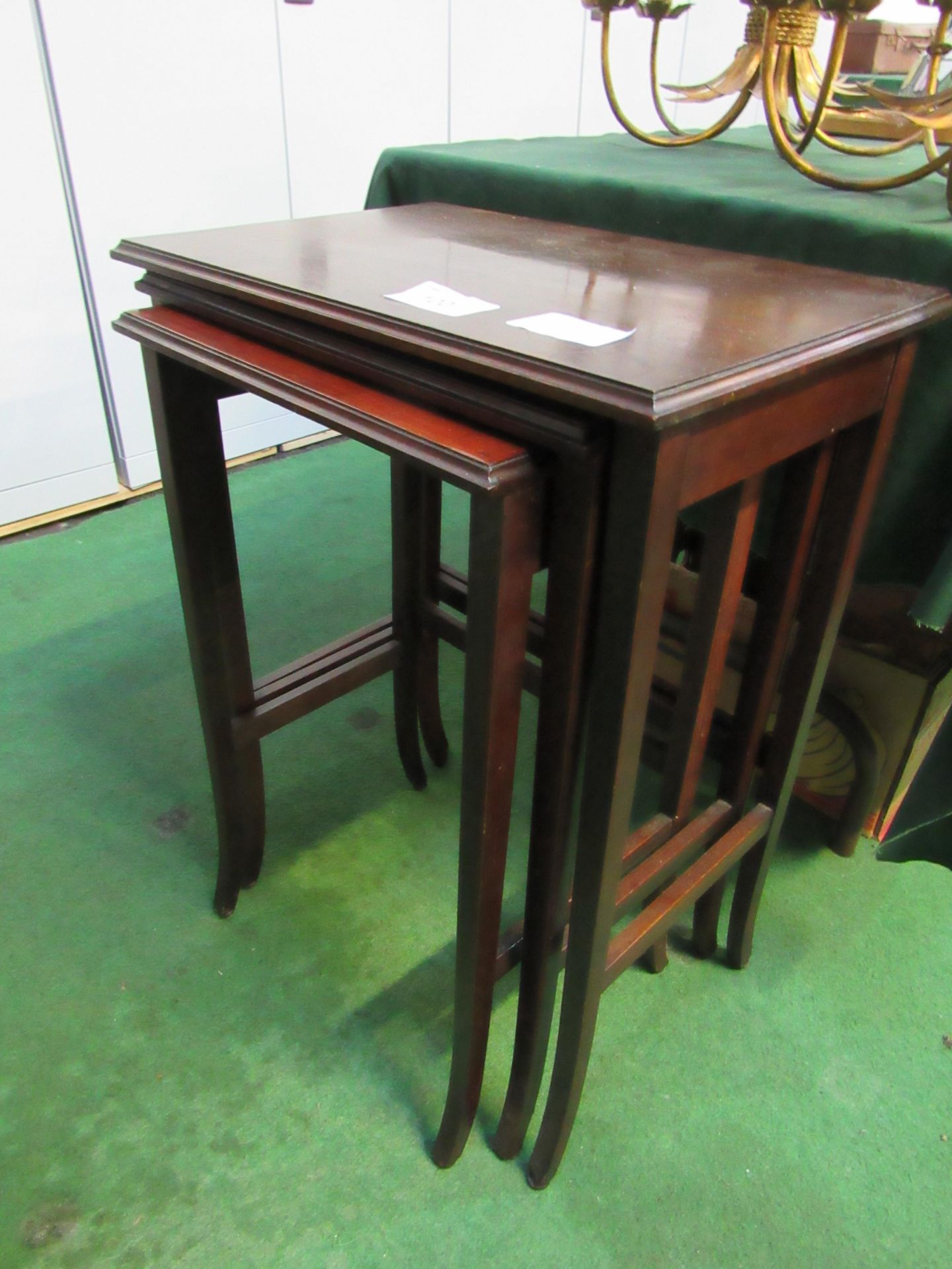 Nest of 3 mahogany side tables . Estimate £20-30
