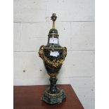 Marble urn shaped lamp with ornate decorations as found. Height 64cm. Estimate £20-40.