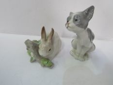 Lladro Rabbit product number 4772, Lladro Cat product number 5113. Estimate £20-30.