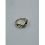 18ct diamond and emerald ring size I, weight 2.9gms. Estimate £150-180.