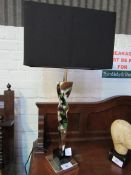 Pair of chrome-effect table lamps with black shade, height of lamp 63cms. Estimate £40-60.