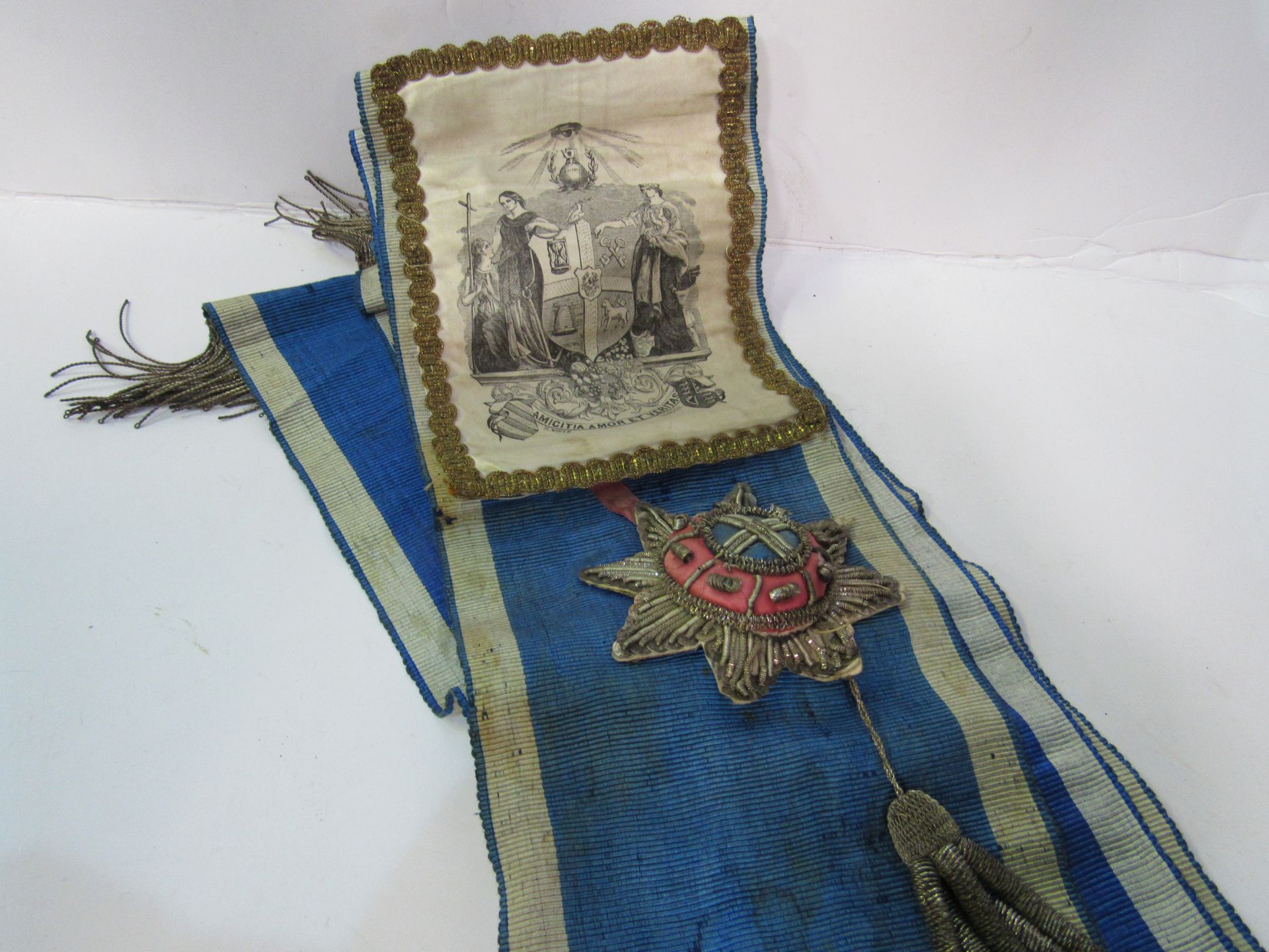 Tin containing an Oddfellows Society sash; Great War 1914-1919 medal; 2 Royal Artillery badges and - Image 2 of 2